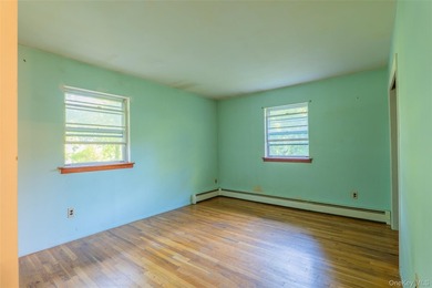 Welcome to 18 Sheryl Lane, a spacious raised ranch nestled on a - photo 18