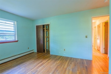 Welcome to 18 Sheryl Lane, a spacious raised ranch nestled on a - photo 19