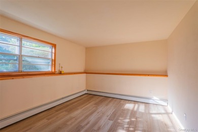 Welcome to 18 Sheryl Lane, a spacious raised ranch nestled on a - photo 27