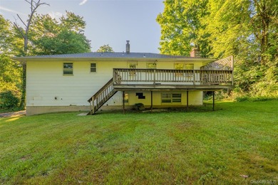Welcome to 18 Sheryl Lane, a spacious raised ranch nestled on a - photo 38
