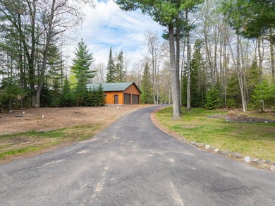 Rare 222' of sandy frontage on Scattering Rice Lake on the - photo 45
