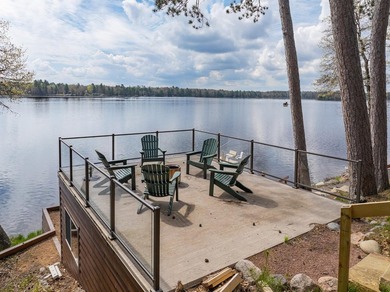 Rare 222' of sandy frontage on Scattering Rice Lake on the - photo 57
