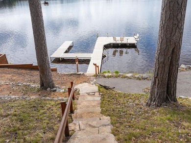 Rare 222' of sandy frontage on Scattering Rice Lake on the - photo 60