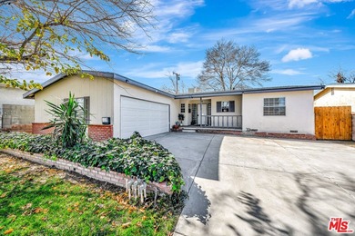 This charming single-story home blends mid-century character - photo 1