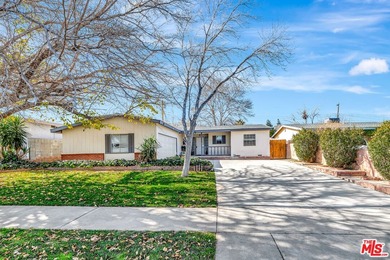 This charming single-story home blends mid-century character - photo 2