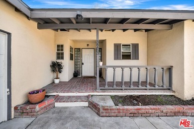 This charming single-story home blends mid-century character - photo 3