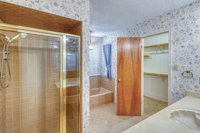 Opportunity awaits in this quaint brick home with a tile roof - photo 15