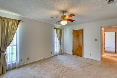 Opportunity awaits in this quaint brick home with a tile roof - photo 20