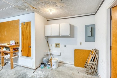 Opportunity awaits in this quaint brick home with a tile roof - photo 23