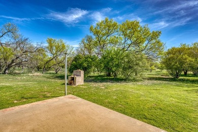 Opportunity awaits in this quaint brick home with a tile roof - photo 25
