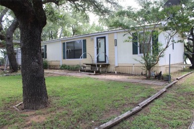 Lake Home For Sale in May, Texas
