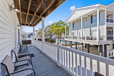 STUNNING 4 BED/4 BATH LAKEFRONT RAISED BEACH HOUSE WITH TONS OF - photo 28