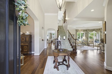 Located in the highly sought-after guarded and gated golf course - photo 3
