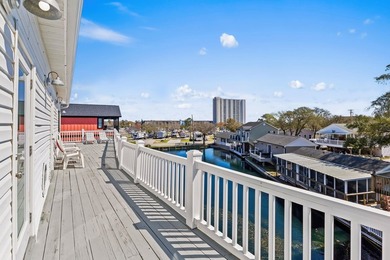 STUNNING 4 BED/4 BATH LAKEFRONT RAISED BEACH HOUSE WITH TONS OF - photo 39