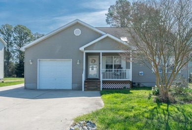 Welcome to your coastal retreat in Captain's Cove Golf & Yacht - photo 1