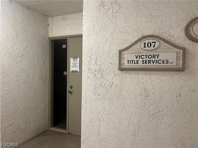 This office condo was just remodeled with new paint and wood - photo 7