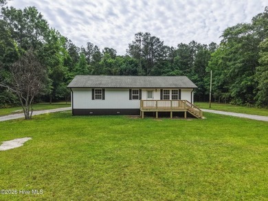 Completely reimagined in 2026, this fully renovated cottage sits - photo 2