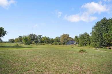 1.4 acres, this doublewide manufactured home offers four