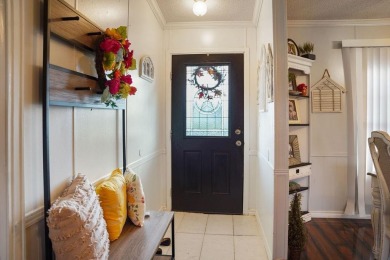 1.4 acres, this doublewide manufactured home offers four