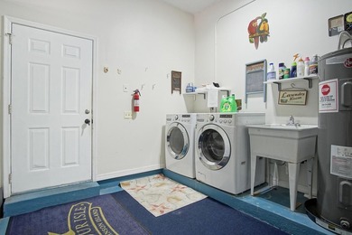 Rare island opportunity! This turnkey 2-unit multifamily gem on - photo 33