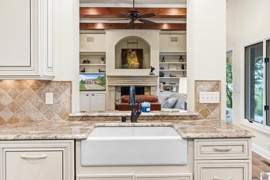 Experience the charm and elegance of this custom- built - photo 11