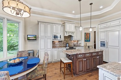 Experience the charm and elegance of this custom- built - photo 12