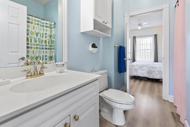 This stunning second-floor 1-bedroom, 1.5-bath condo offers - photo 17