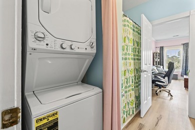 This stunning second-floor 1-bedroom, 1.5-bath condo offers - photo 20