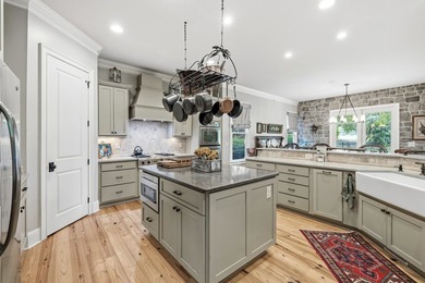 Beautifully updated custom home in The Coves at Cuscowilla - photo 9