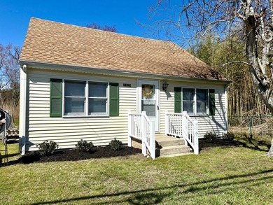 This well-maintained home offers a bright and inviting layout - photo 2