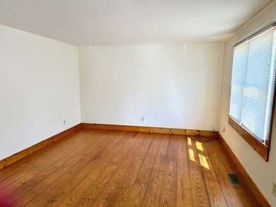 This well-maintained home offers a bright and inviting layout - photo 4