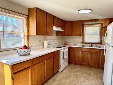 This well-maintained home offers a bright and inviting layout - photo 6