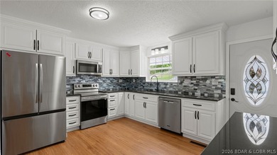 Enjoy lakefront living at its best in this beautifully remodeled - photo 12