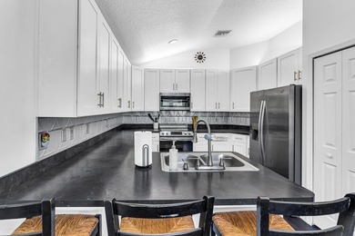 Welcome Home to this 3-bed, 2-bath waterfront home built in 2017 - photo 12