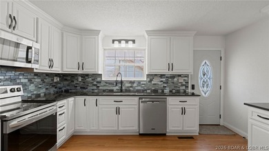 Enjoy lakefront living at its best in this beautifully remodeled - photo 14