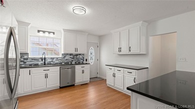 Enjoy lakefront living at its best in this beautifully remodeled - photo 15