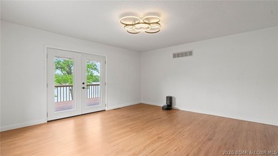 Enjoy lakefront living at its best in this beautifully remodeled - photo 24