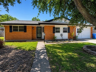 Welcome home to this solid brick 4-bedroom, 2-bathroom property - photo 1