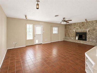 Welcome home to this solid brick 4-bedroom, 2-bathroom property - photo 2