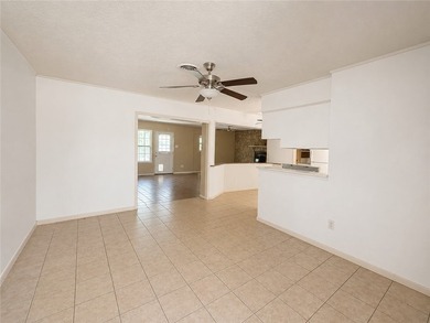 Welcome home to this solid brick 4-bedroom, 2-bathroom property - photo 4