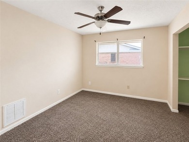 Welcome home to this solid brick 4-bedroom, 2-bathroom property - photo 6
