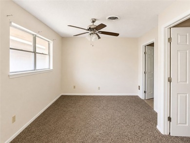 Welcome home to this solid brick 4-bedroom, 2-bathroom property - photo 7