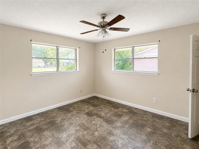 Welcome home to this solid brick 4-bedroom, 2-bathroom property - photo 9