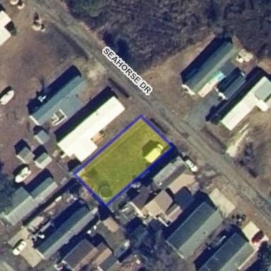 Build your coastal getaway on this vacant mobile home lot - photo 1