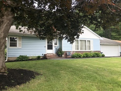 Welcome home to this beautifully maintained ranch in one of - photo 1
