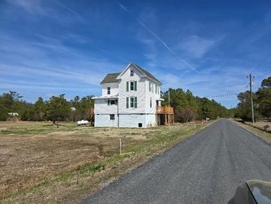 Watermen's Cottage: Perched above the flood elevations with - photo 1