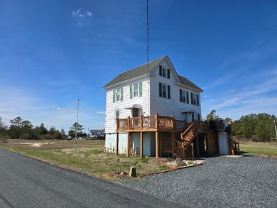 Watermen's Cottage: Perched above the flood elevations with - photo 4