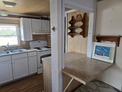 Watermen's Cottage: Perched above the flood elevations with - photo 6