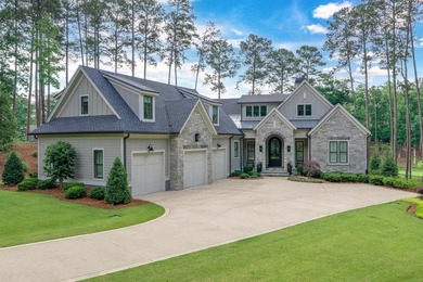 LIKE-NEW CUSTOM GOLF COURSE HOME POSITIONED ALONG THE 8TH HOLE - photo 1