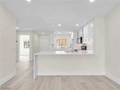 Welcome to this FULLY RENOVATED condo offering tranquil lake - photo 11